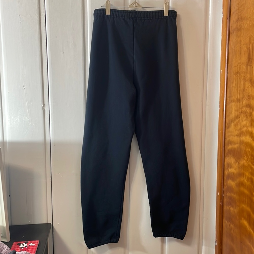 Medium black sweatpants that scrunch at the bottom and adjustable drawstring